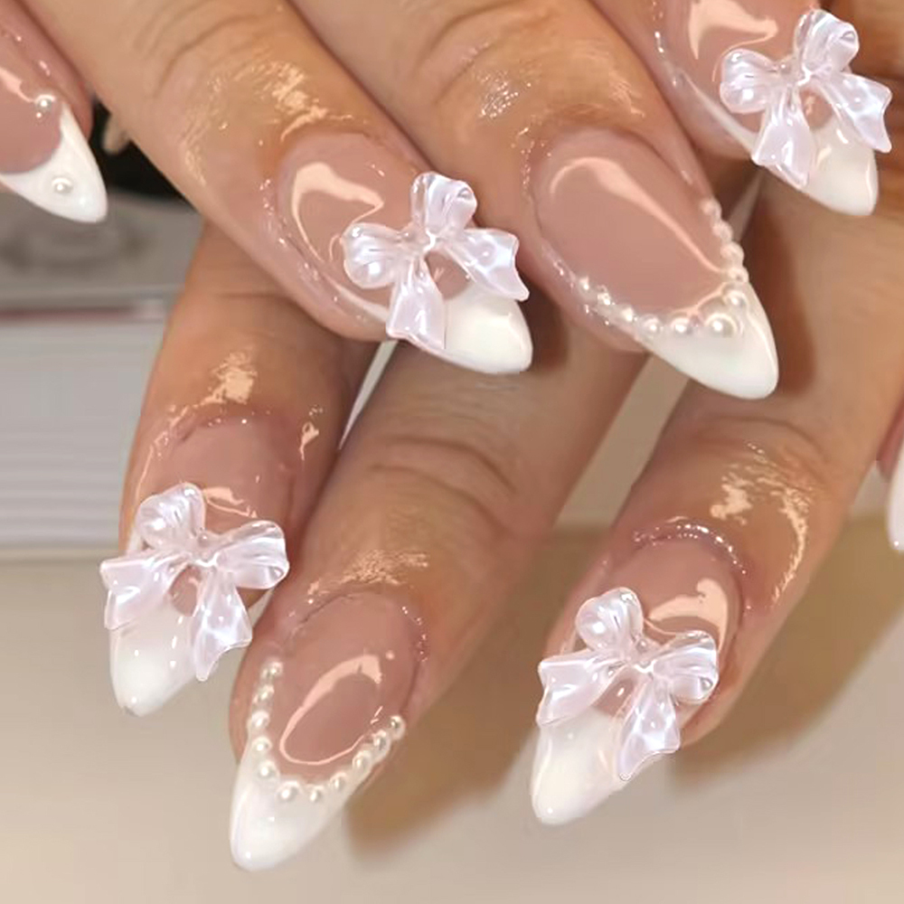 24pcs สั้นกดบนเล็บ Stiletto สีชมพู Bowknot แฟลช Dril ปลายนิ้วภาษาฝรั่งเศสคํา Trim กดบนฝาครอบเล็บปลอมชุด