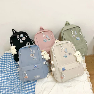 กระเป๋าเป้สะพายหลังน่ารักพร้อมจี้นักศึกษาวิทยาลัยรายการหนังสือกระเป๋าสะพาย
