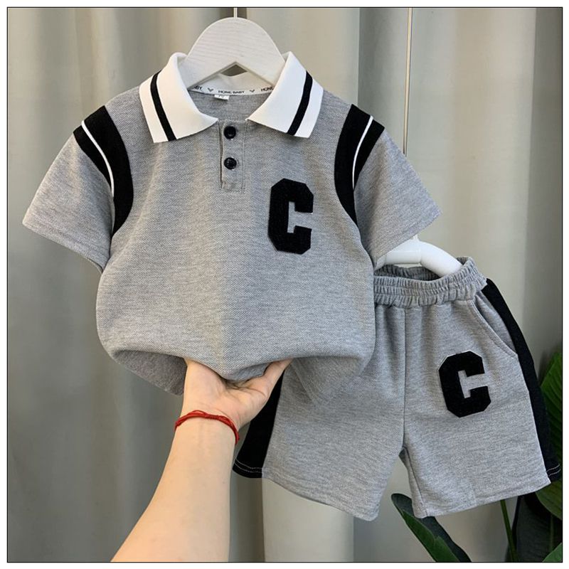 ฤดูร้อนใหม่เสื้อผ้าชุดเด็กทารกหญิงกีฬาชุดลําลองเด็กเสื้อแขนสั้นกางเกงขาสั้น2ชิ้นจดหมายเครื่องแต่งกายเด็กวอร์ม