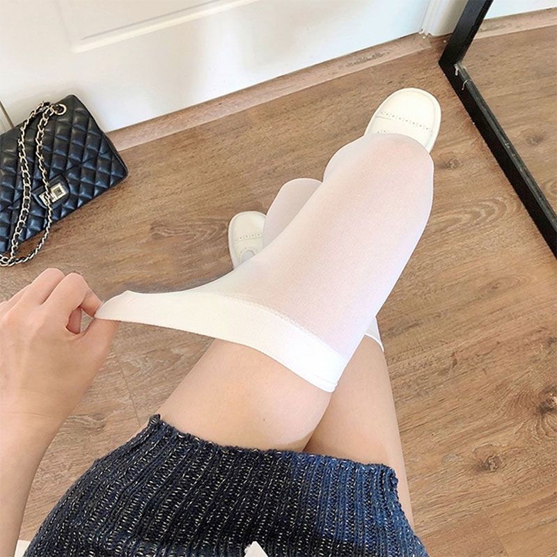 ถุงเท้ายาวเหนือเข่านมสีขาวผู้หญิงถุงเท้ากํามะหยี่โปร่งใส Bottoming ผู้หญิงญี่ปุ่นถุงน่องผ้าไหมสีขาวสีดํา Over-the-K