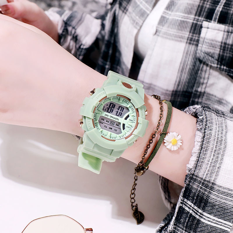 W0095 นาฬิกาข้อมือสปอร์ต สีมาการอง กันน้ํา สไตล์เกาหลี สําหรับผู้ชาย ผู้หญิง นักเรียน