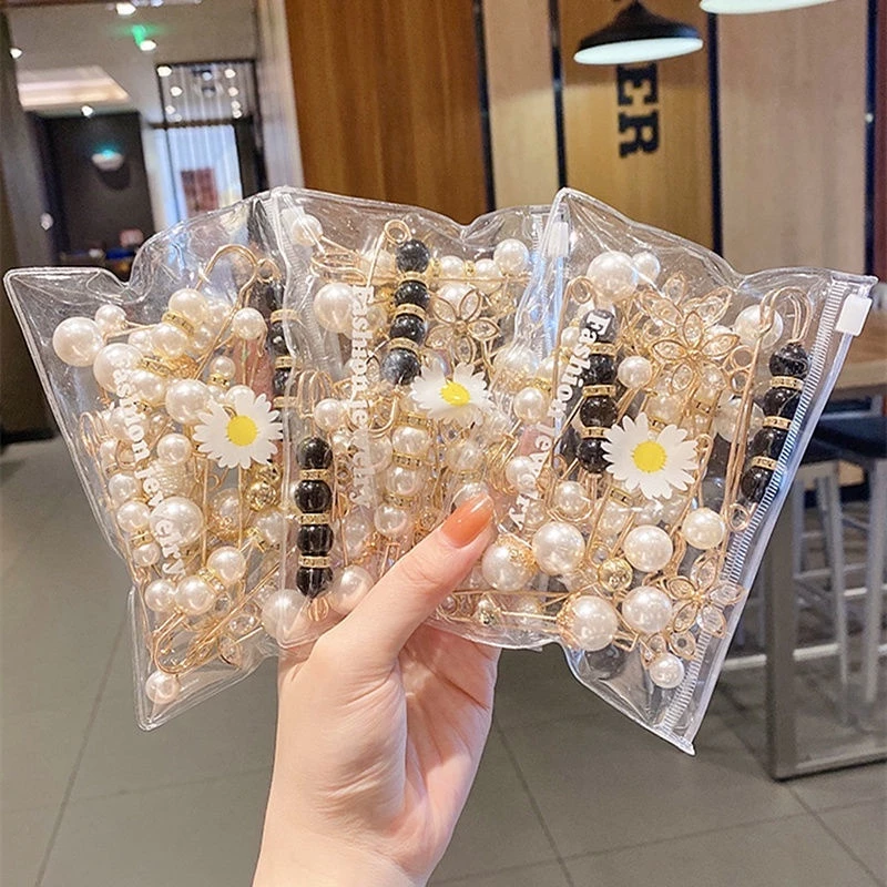 ร้อนของขวัญ12ชิ้น เข็มหมุด เกาหลีมุกเอวคลิปเข็มกลัดผู้หญิงแฟชั่นกางเกงเข็มขัดอุปกรณ์เสริม