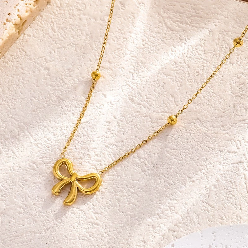 Gold Bow Tie สร้อยคอผู้หญิง Hypoallergenic Titanium Cubic Zirconia Vintage Dainty เครื่องประดับของขวัญ