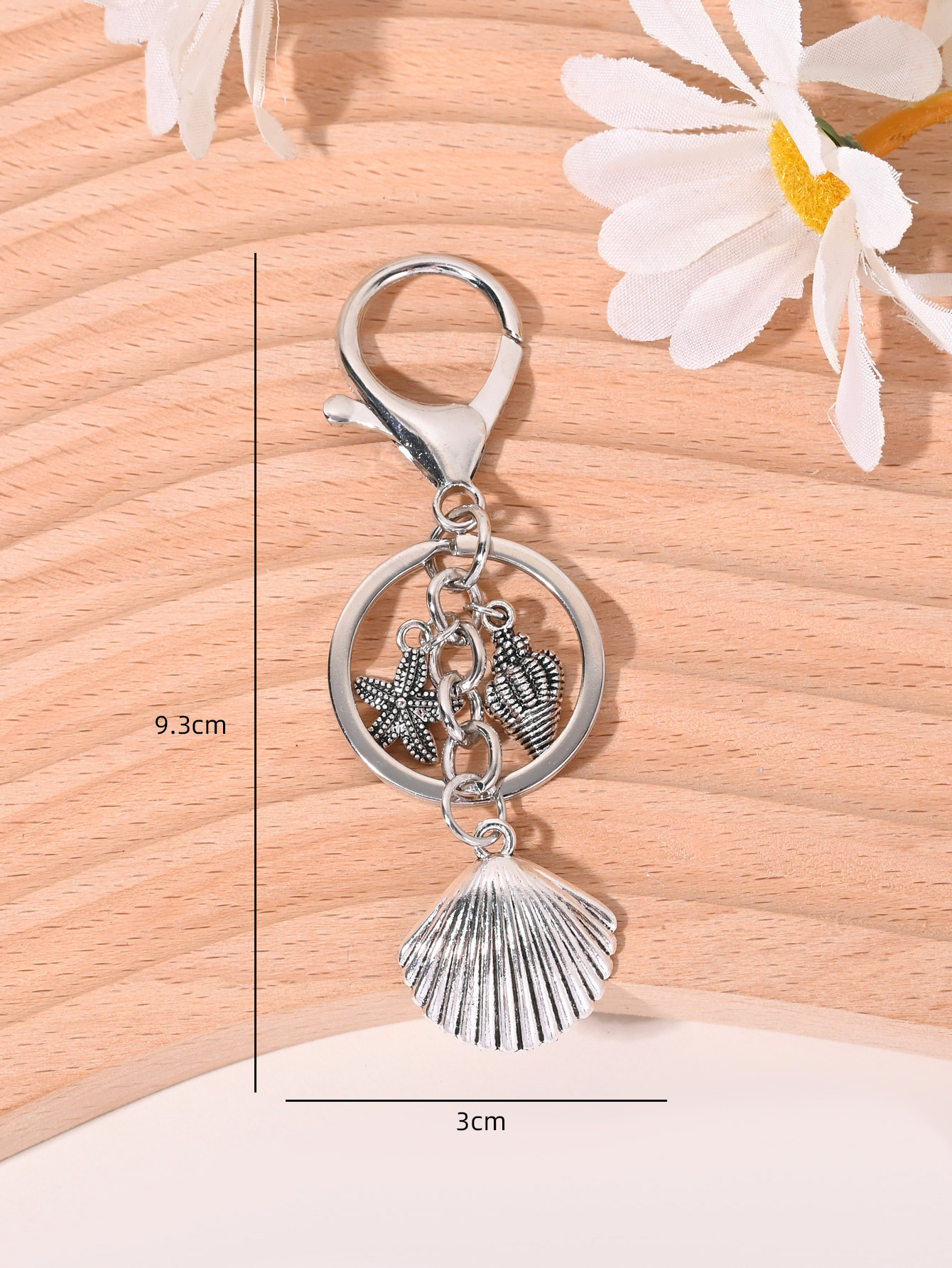 สไตล์พักร้อนริมชายหาด พวงกุญแจจี้รูปปลาดาว หอยสังข์ ไข่มุกเทียม อุปกรณ์เสริมกระเป๋า พวงกุญแจรถ ของที่ระลึก เหมาะสําหรับทั้งผู้ชายและผู้หญิง (1 ชิ้น) - รูปที่ 5