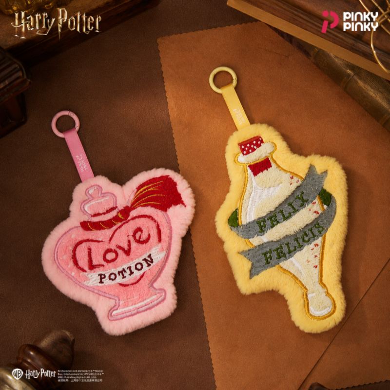 พวงกุญแจเสน่ห์ตุ๊กตา Harry Potter ที่ได้รับอนุญาต Love Potion พวงกุญแจ, กระเป๋าใส่เหรียญซิปน่ารักสําหรับปาร์ตี้ Commute ทุกวันของขวัญวันเกิดคริสต์มาสสําหรับแฟนนักเรียนคนงาน