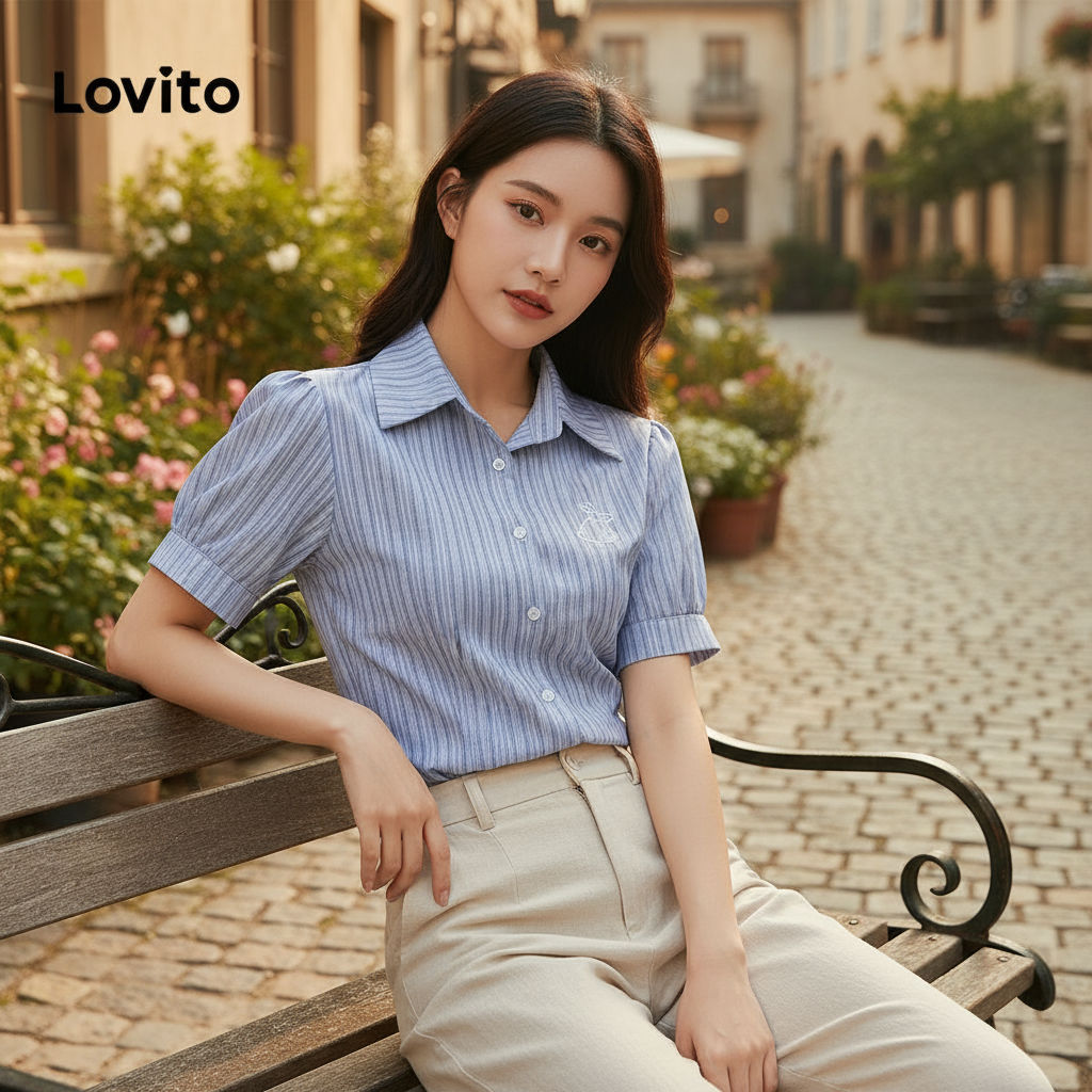 Lovito เสื้อเชิ้ตผู้หญิงแขนพอง ปักลายด้านหน้าติดกระดุม L58AD035 (สีฟ้า)