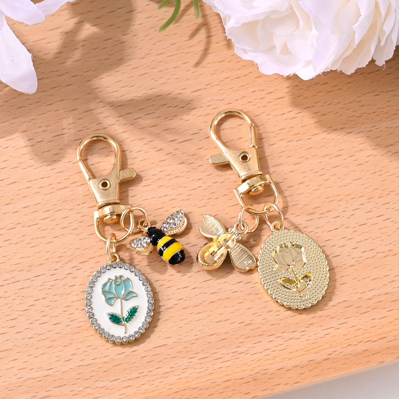 ฝรั่งเศสประณีตเพชรล้อมรูปไข่ยี่ห้อ Rose Bee พวงกุญแจกระเป๋าหูฟังเคสโทรศัพท์ตกแต่งรถ Best Friend จี้ 2 ganungan kunci gantungan tas ของขวัญสําเร็จการศึกษา ราคา ถูกที่สุด ดีลบีเคเค แกลเลอรีภาพที่ 5