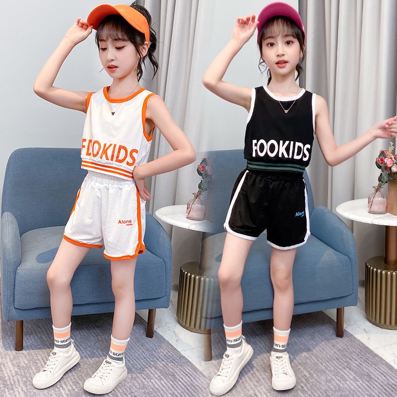ชุดกีฬาเด็กผู้หญิงอายุ 3-14 ปี, เสื้อผ้าฮิปฮอปฮิปฮอป, เสื้อกั๊กกีฬาแห้งเร็วสไตล์ต่างประเทศสำหรับเด็กและกางเกงขาสั้นชุดสองชิ้น, เสื้อกั๊กแขนกุดระดับไฮเอนด์ทอดถนนแฟชั่น, การวิ่งแฟชั่นของสาวสบาย ๆ ชุดสองชิ้น