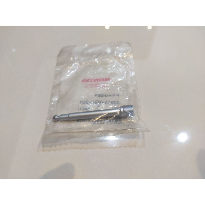 น็อตสลักล็อคผ้าเบรคหลัง Wave 125/Sonic 125 แท้ศูนย์43215-KGH-901