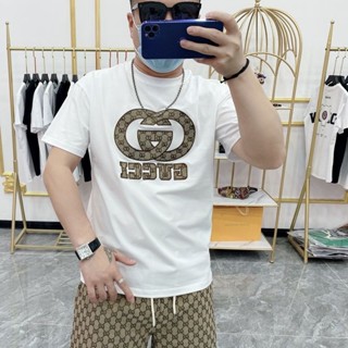 Gucci เสื้อยืดคอกลม ผ้าฝ้ายแท้ ปักลายโลโก้ G ขนาดใหญ่ ทรงหลวม สําหรับผู้ชาย และผู้หญิง