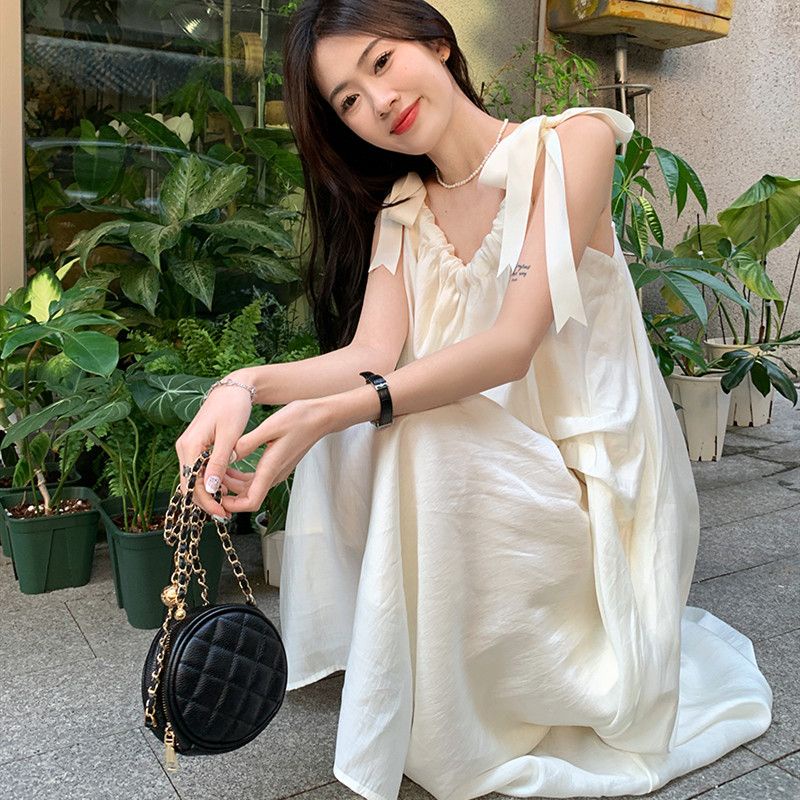 ER SKIRT ชุดเดรสยาวแขนกุดชายหาดแสนหวานและอ่อนโยน