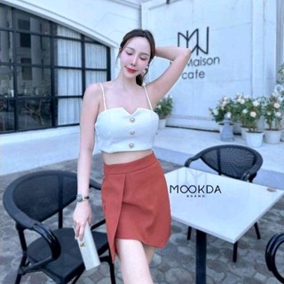 Set เสื้อครอปสายเดี่ยว + กระโปรงตัดแต่งชายสวยเก๋ สีสันสดใส 🍊 Mookda