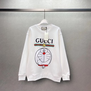 Gucci เสื้อกันหนาว คอกลม พิมพ์ลายตัวอักษร Doraemon แฟชั่นฤดูใบไม้ผลิ สําหรับผู้ชาย และผู้หญิง 2023