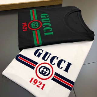 Gucci ใหม่ เสื้อยืดแขนสั้น ผ้าฝ้ายแท้ พิมพ์ลายตัวอักษร สไตล์ยุโรป และอเมริกา แฟชั่นฤดูร้อน สําหรับผู้ชาย และผู้หญิง 1921