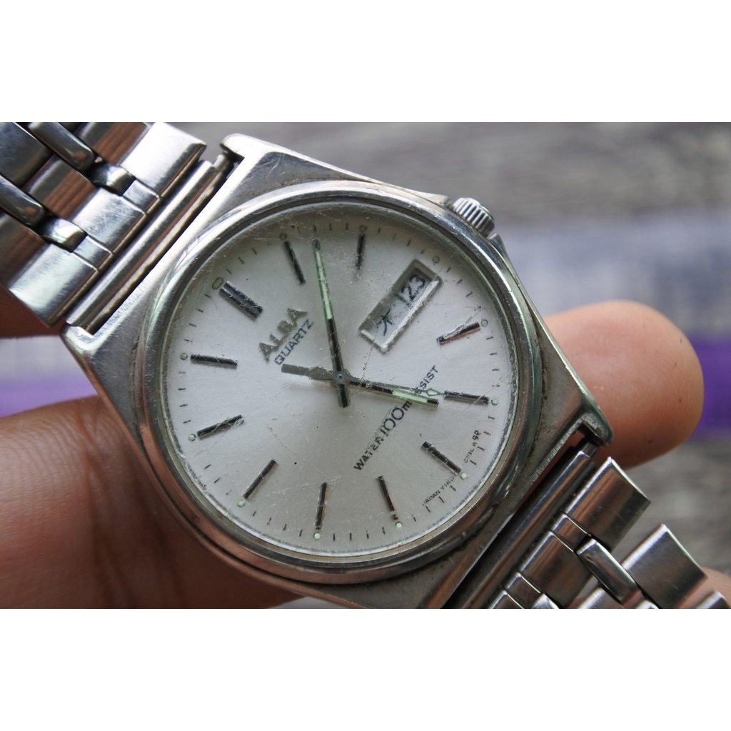 นาฬิกา Vintage มือสองญี่ปุ่น ALBA Y143 8141 ระบบ QUARTZ ผู้ชาย ทรงกลม กรอบเงิน หน้าขาว หน้าปัด 36มม