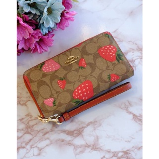 🥳กระเป๋าสะพาย มีสายคล้องมือ👛New coach Long Zip Around Wallet In Signature Canvas With Wild Strawberry Print