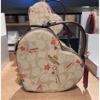 ❤️คอลเลคชั่นใหม่กระเป๋าสะพายรูปหัวใจ❤️ Coach Heart Crossbody In Signature Canvas With Heart And Star Print