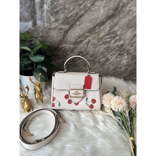 🎉🍒🍒กระเป๋าสะพายสีขาว ลายน้องเชอรี่ สายยาว สะพายถอดได้
💢NEW COACH Morgan Top Handle Satchel With Heart Cherry Print