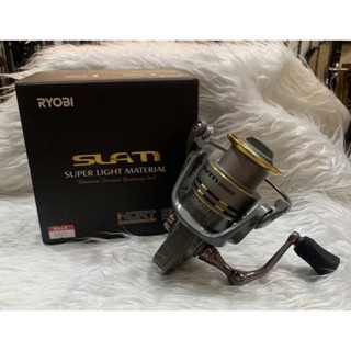 รอก Slam 3000 สปูนเทาทอง by.Ryobi