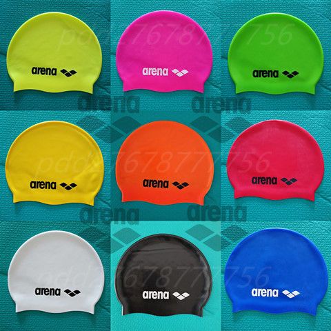 Arena Arena หมวกว่ายน้ำซิลิโคนยืดหยุ่นสูงสีบริสุทธิ์ขยายป้องกันหูกันน้ำ ขนาดเดียวเหมาะกับทุกคนสำหรับ