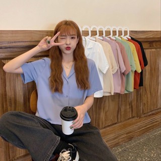 ใหม่ เสื้อครอปแขนสั้นลําลอง ทรงหลวม แต่งกระดุม สีพื้น สําหรับผู้หญิง