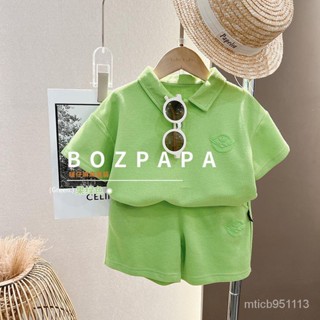 ชุดเด็กผู้ชาย2023ฤดูร้อนใหม่สีล้วนเรียบง่ายผ้าฝ้ายมุกPoloชุดสองชิ้น