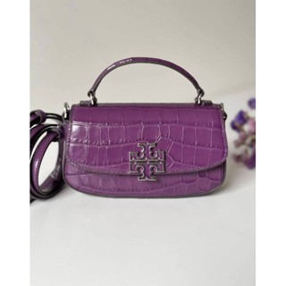 💜💜👜New Tory burch Britten mini top Handle Bagหนังแท้ทั้งใบ สีอปลกตาไม่ซ้ำใครนะแม่
สีม่วงสวยงามมาก มีหูจับ