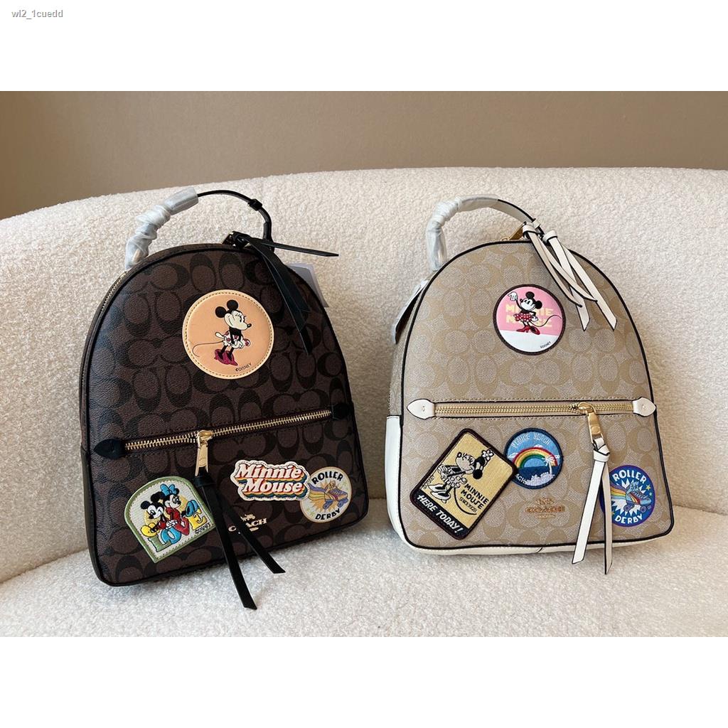 ﹊☢Coach 2022 New Mickey Backpack Leather Material Cute Fashion Gold Size Daily Hand Carry Men s and Women s Backpacks