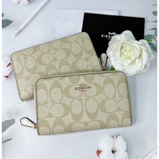 กระเป๋าสตางค์ใบกลาง รุ่นใหม่ ใส่แบงค์พันได้NEW COACH MEDIUM ZIP AROUND WALLET