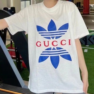 ใหม่ GUCCI เสื้อยืดแขนสั้นลําลอง ผ้าฝ้ายแท้ เข้ากับทุกการแต่งกาย แฟชั่นเรียบง่าย สําหรับผู้ชาย และผู้หญิง 2023