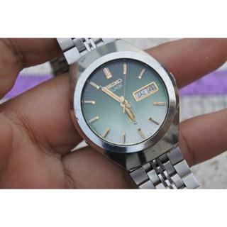 นาฬิกา Vintage มือสองญี่ปุ่น SEIKO ELNIX 0703 8040 ระบบ QUARTZ ผู้ชาย ทรงกลม กรอบเงิน หน้าปัดสีเขียว หน้าปัด 37มม