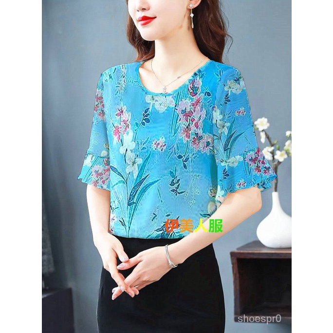 👕เสื้อชีฟองผู้หญิง2023ปานกลาง รุ่นใหม่ แบบหลวม สีขาว แขนใบบัว พิมพ์ลาย