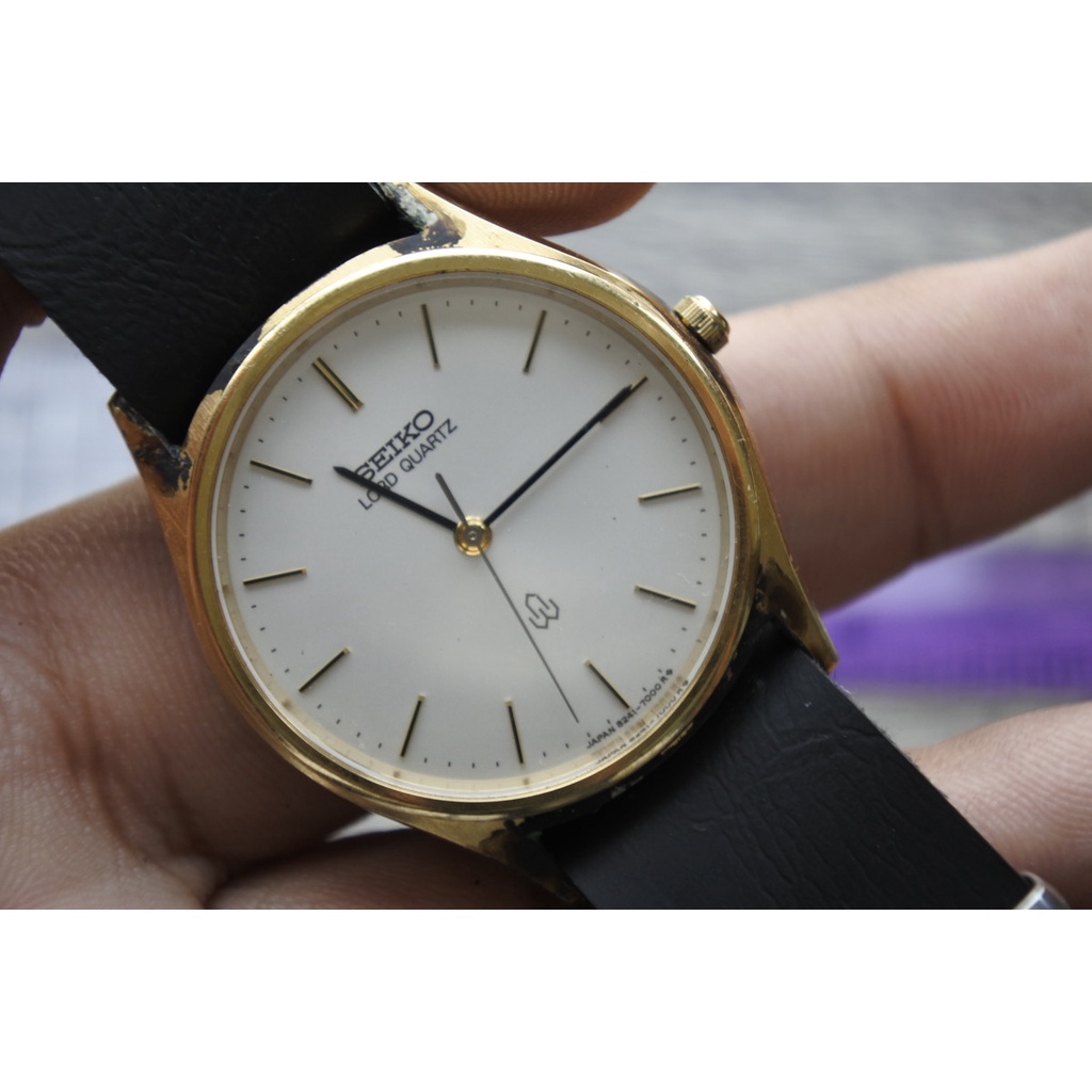 นาฬิกา Vintage มือสองญี่ปุ่น SEIKO LORD QUARTZ 8241 7000 ผู้ชาย ทรงกลม กรอบทอง หน้าขาว หน้าปัด34มม