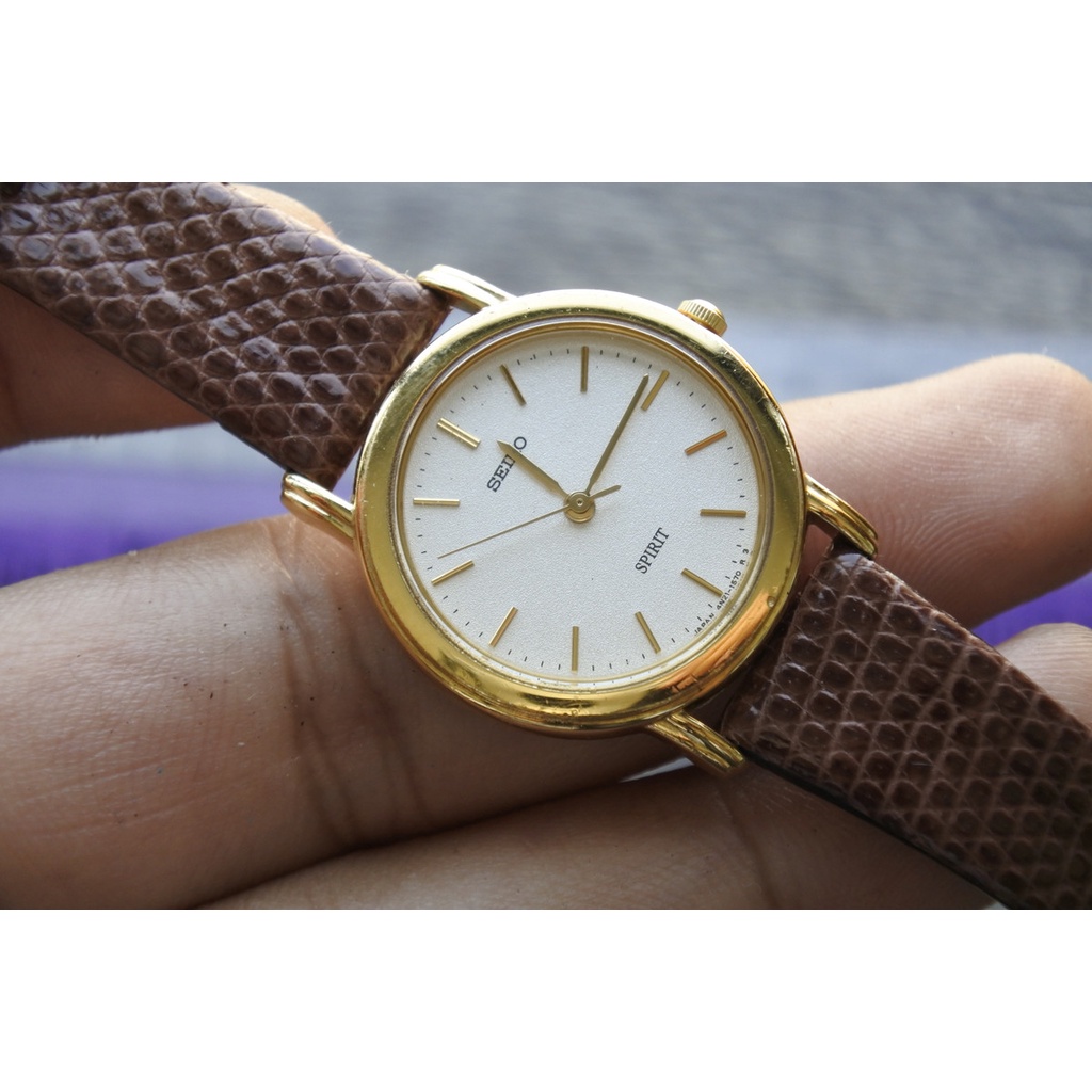 นาฬิกา Vintage มือสองญี่ปุ่น Seiko Spirit 4N21 0810 ระบบ QUARTZ ผู้หญิง ทรงกลม กรอบทอง หน้าขาว หน้าปัด26มม