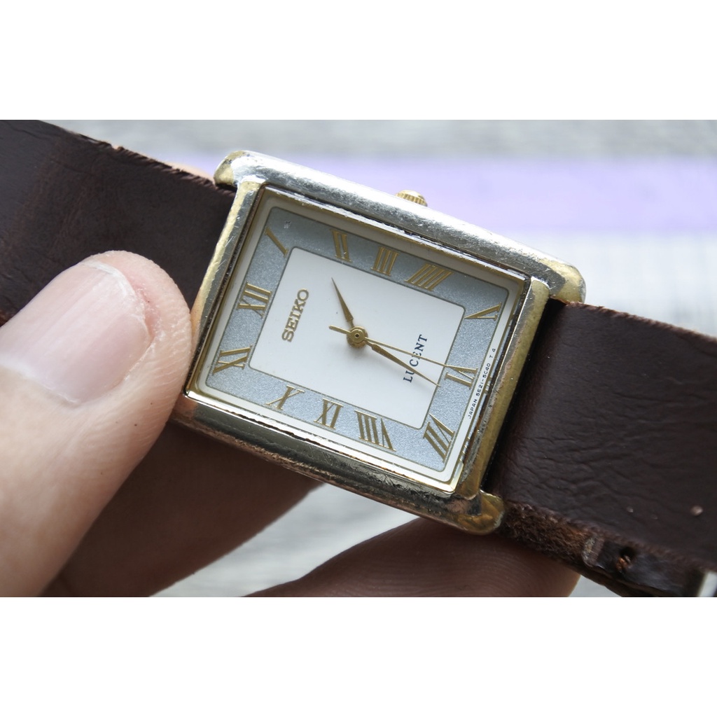นาฬิกา Vintage มือสองญี่ปุ่น SEIKO LUCENT 5E21 5C10 QUARTZ UNISEX ทรงสี่เหลี่ยม กรอบทอง หน้าปัดตัวเลขโรมัน หน้าปัด25มม