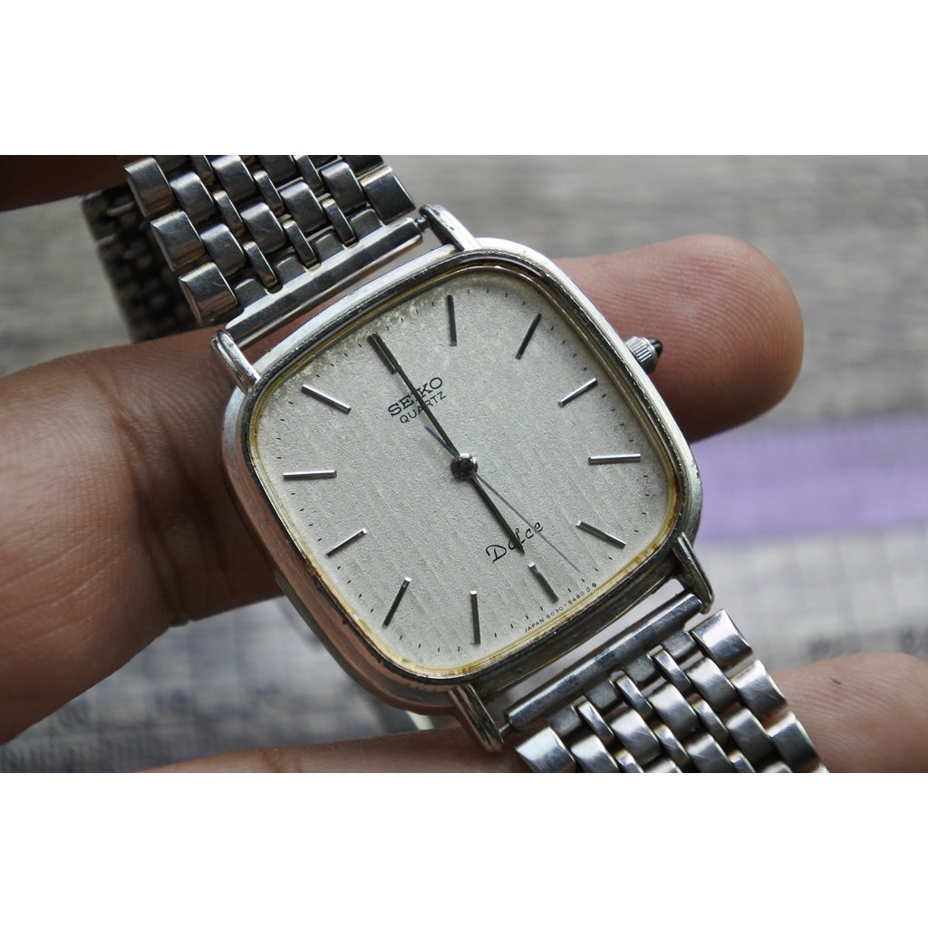นาฬิกา Vintage มือสองญี่ปุ่น SEIKO DOLCE 6090 5420 ระบบ QUARTZ ผู้ชาย ทรงสี่เหลี่ยม กรอบเงิน หน้าขาว หน้าปัด32มม