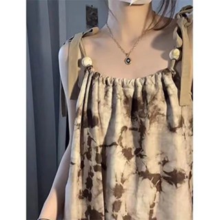ชุดไปทะเล ฝรั่งเศสผูกย้อมเสื้อผ้าหญิงอินเทรนด์สาวมูลค่าสูงชุดผู้หญิง 2023 ใหม่หวานและเผ็ดบางช่องกระโปรงลื่นยาว