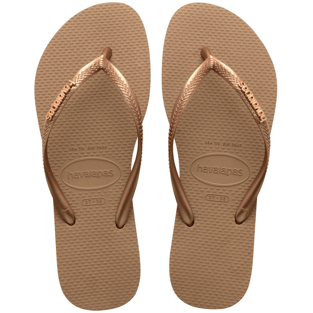 HAVAIANAS รองเท้าแตะผู้หญิง Slim Logo Metallic Flip Flops GOLD 41198753581F_H3GDXX