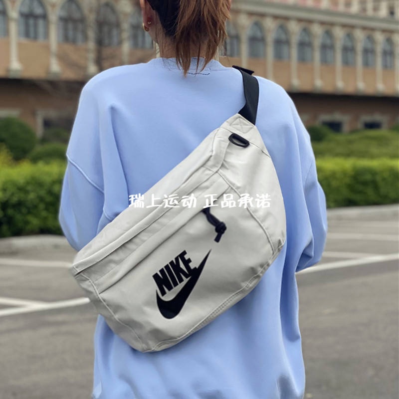 ✎☜▥Nike NIKE Sports กระเป๋าคาดเอวสำหรับผู้ชายและผู้หญิงกระเป๋าคาดหน้าอก Wang Yibo สไตล์เดียวกันกระเป๋าสะพายข้างขนาดใหญ่