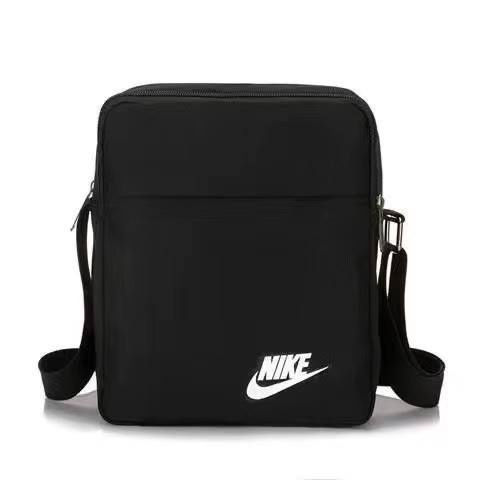 ┇✼Nike กระเป๋าสะพายไหล่ Nike กระเป๋าเป้สะพายหลังขนาดเล็กสำหรับผู้ชายและผู้หญิงเดินทางแบบสบาย ๆ โทรศัพท์มือถือเอกสารอย่าง