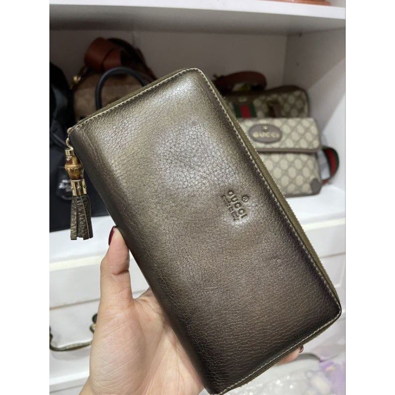 Gucci Iridescent brown leather wallet
