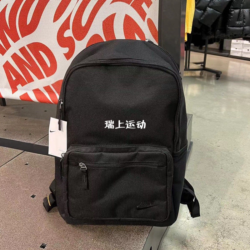 ﺴ✎Nike Official HERITAGE EUGENE กระเป๋าเป้สะพายหลังกระเป๋านักเรียนช่องเก็บของประกบรองรับ DB3300