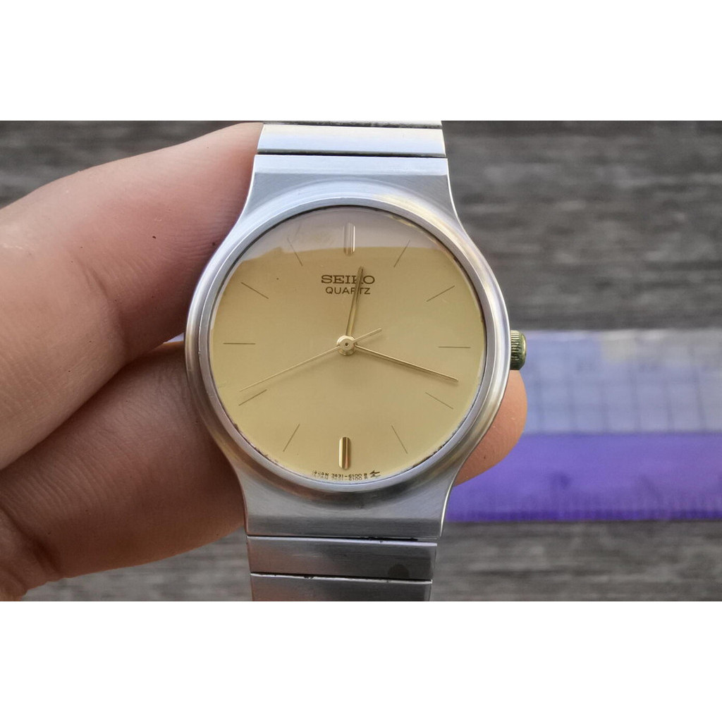 นาฬิกา Vintage มือสองญี่ปุ่น Seiko 7431 6090 หน้าสีเหลืองทอง Unisex ทรงกลม ระบบ Quartz ขนาด30mm ใช้งานได้ปกติ