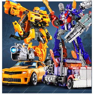 หุ่นยนต์ของเล่น Metamorphosis: Optimus Bumblebee, King Kong, Dinosaur Boy Metamorphosis โมเดลโลหะผสม แฮนด์เมด