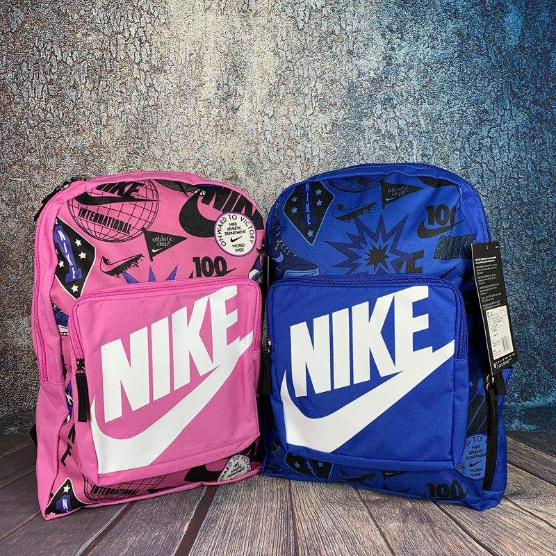 ℡๑✎NIKE/Nike กระเป๋าเป้สะพายหลังเด็กใหม่สำหรับผู้ชายและผู้หญิงกระเป๋านักเรียนลายกระเป๋าใบเล็ก BA5995-013