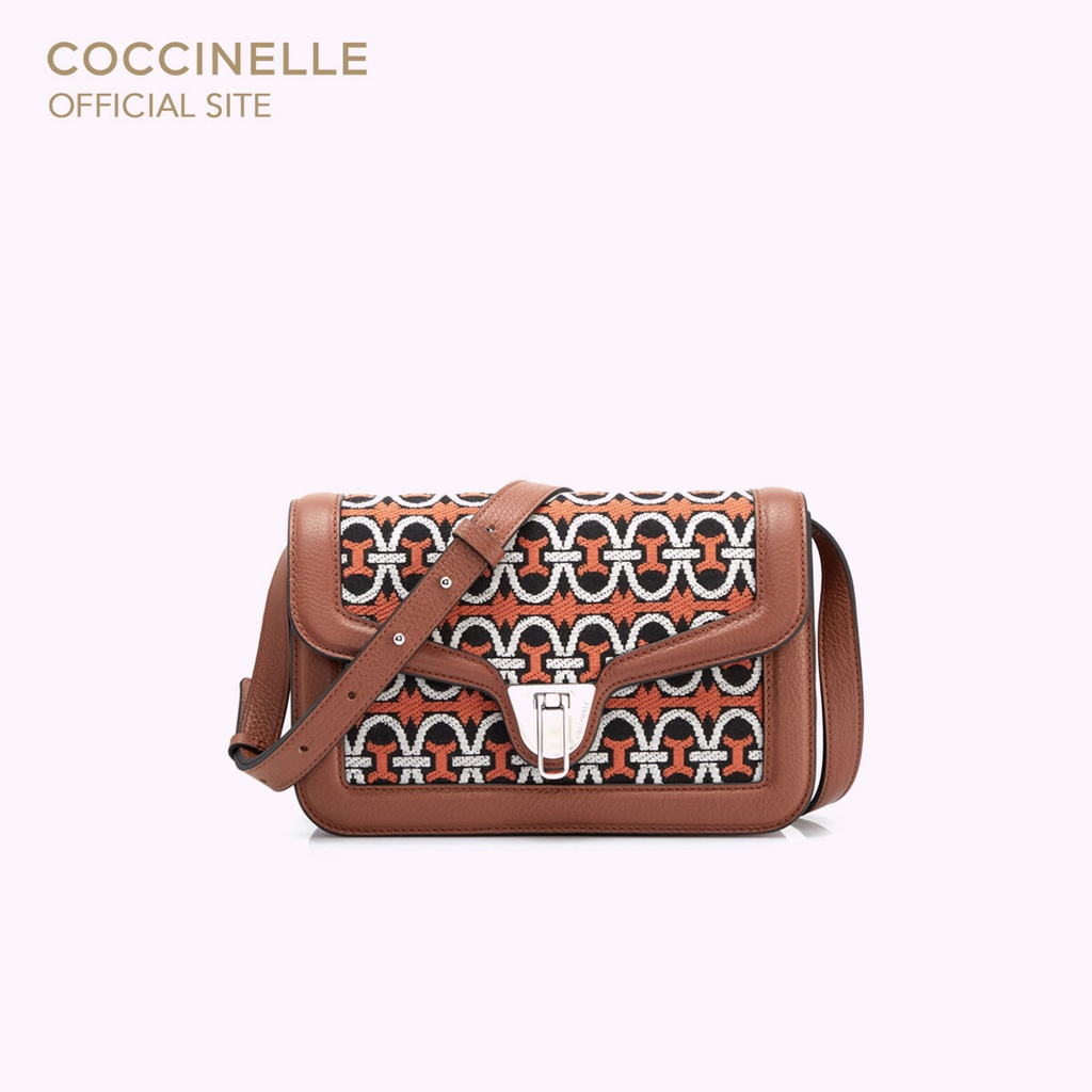 COCCINELLE กระเป๋าสะพายผู้หญิง รุ่น MARVIN TWIST MONOGRAM CROSSBODY BAG 150101 สี MULT.GELSO/BRUL