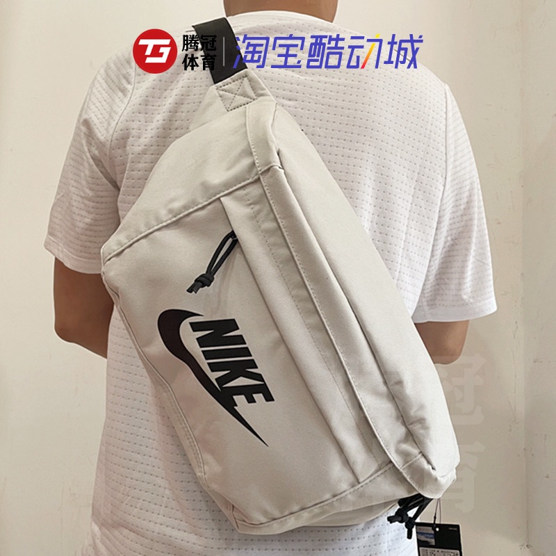☼◑Nike NIKE กระเป๋าคาดเอวกีฬาลำลองสำหรับผู้ชายและผู้หญิงกระเป๋าคาดหน้าอก Wang Yibo สไตล์เดียวกันกระเป๋าสะพาย crossbody ข
