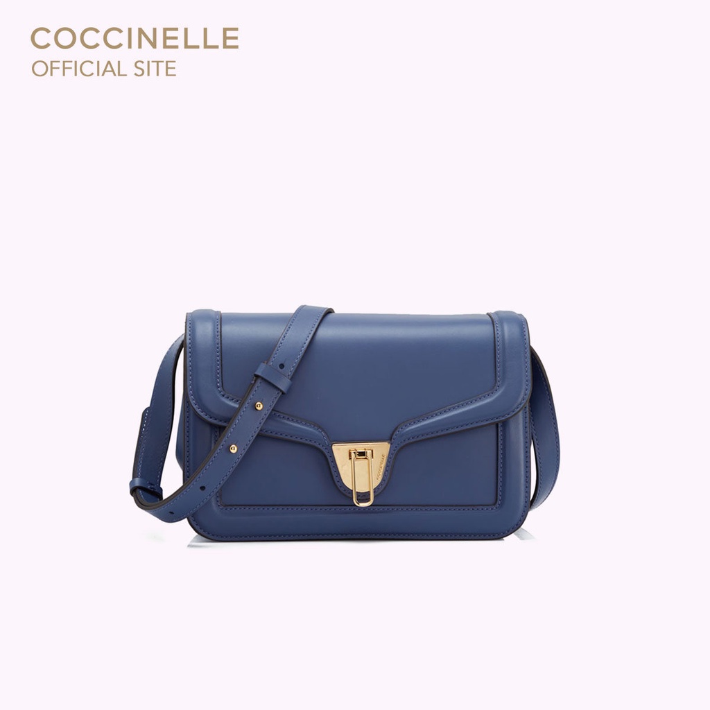 COCCINELLE กระเป๋าสะพายผู้หญิง รุ่น MARVIN TWIST CROSSBODY BAG 150101 สี MIRTILLO