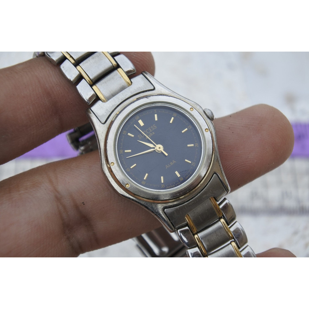 นาฬิกา Vintage มือสองญี่ปุ่น Alba Success V701 6670 หน้าดำ ผู้หญิง ทรงกลม ระบบ Quartz ขนาด25mm ใช้งานได้ปกติ ของแท้