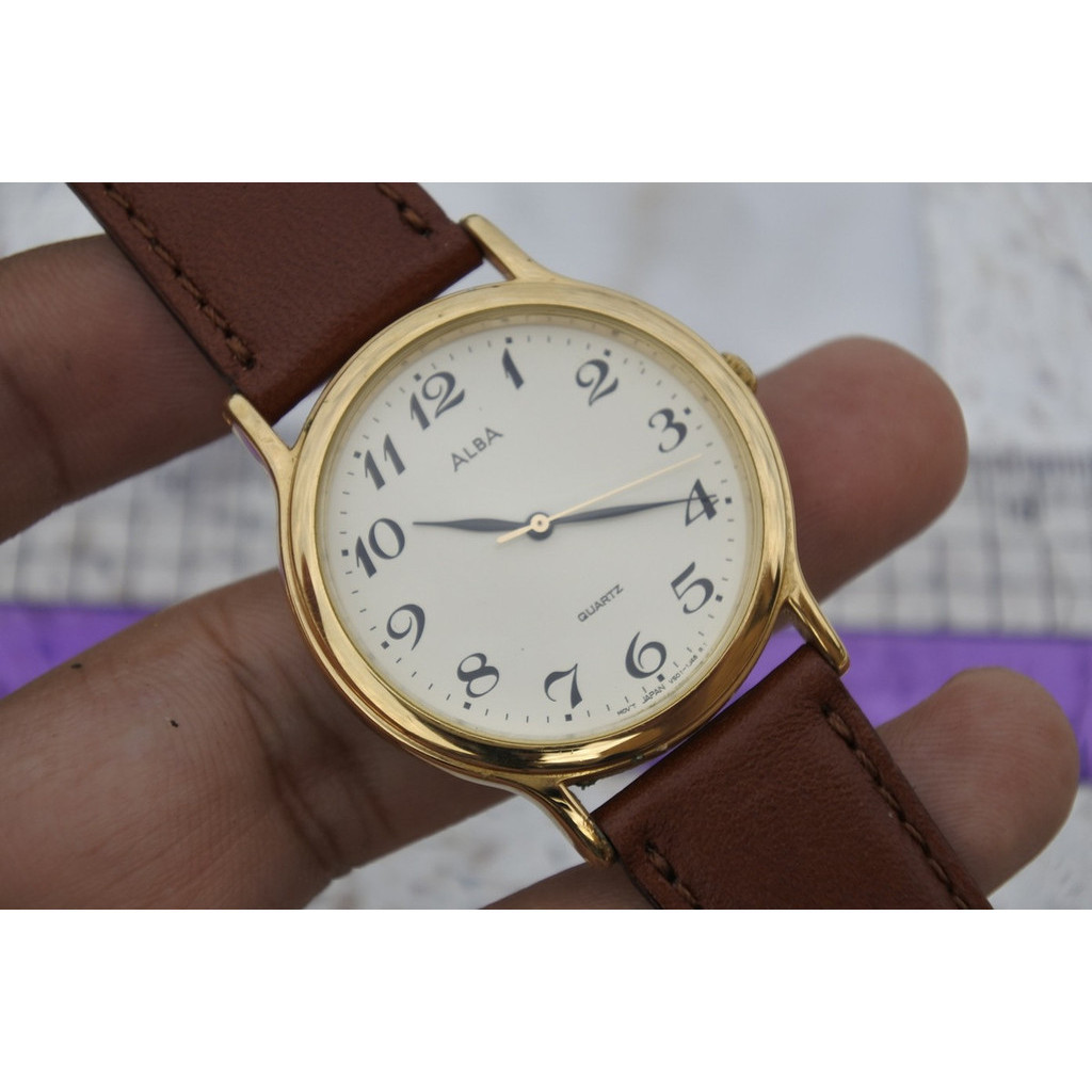 นาฬิกา Vintage มือสองญี่ปุ่น Alba V501 6K80 หน้าขาว ผู้หญิง ทรงกลม ระบบ Quartz ขนาด16mm ใช้งานได้ปกติ ของแท้